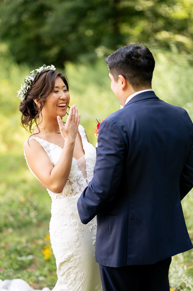 bride and groom first look at rock island lake club