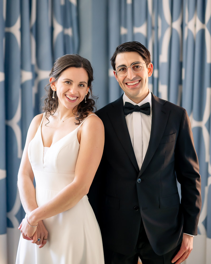 bride and groom wedding portraits in Hotel Monaco Suite